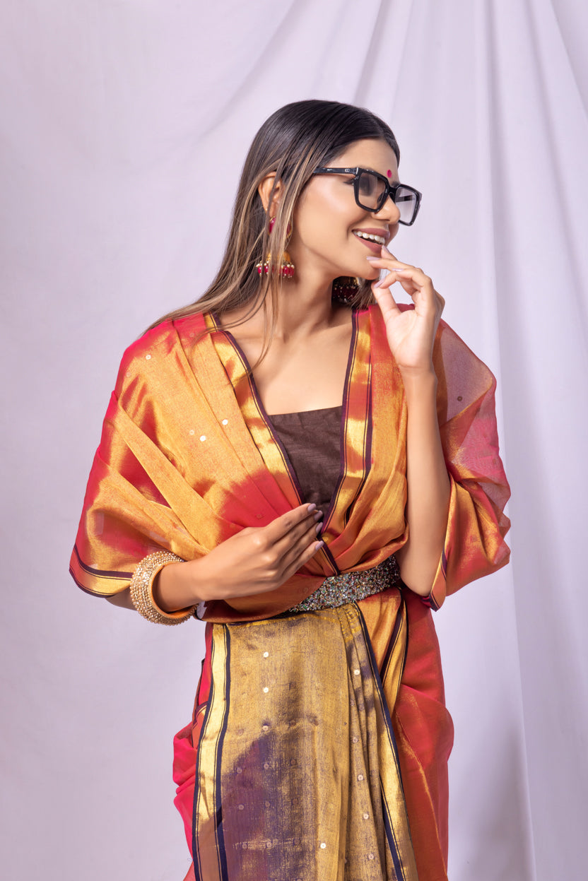 Woman wearing a colorful traditional outfit with a plain background