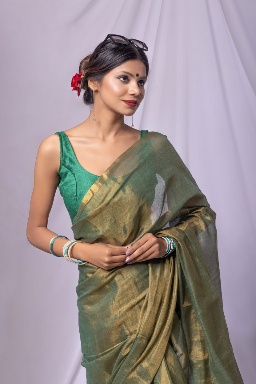 Handwoven linen tissue saree with subtle striped pallu design
