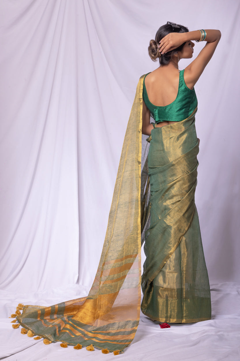 Minimal linen tissue saree with contrast striped pallu